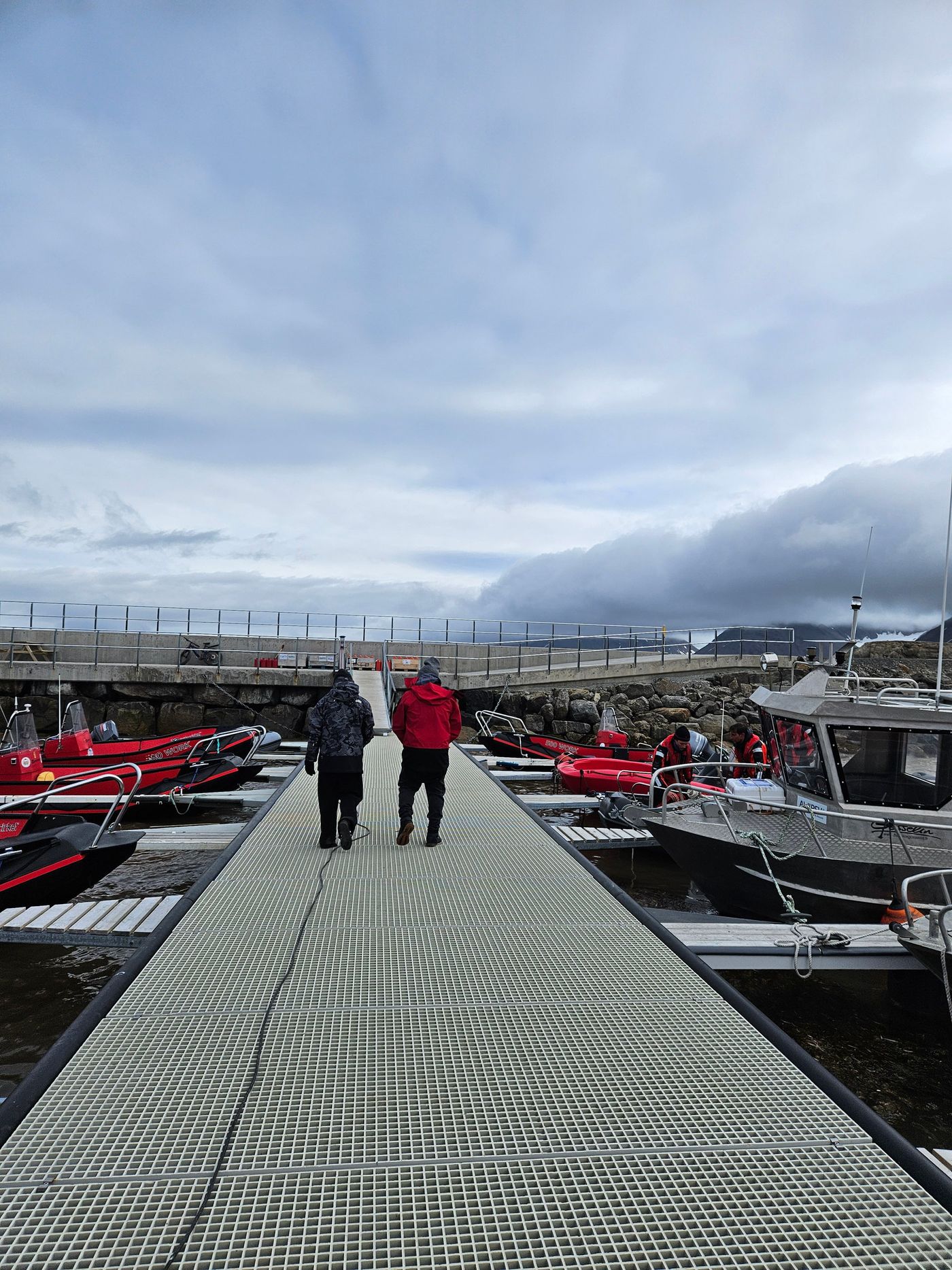 Down the pontoon in the blow, thirty-seven hours into the wait