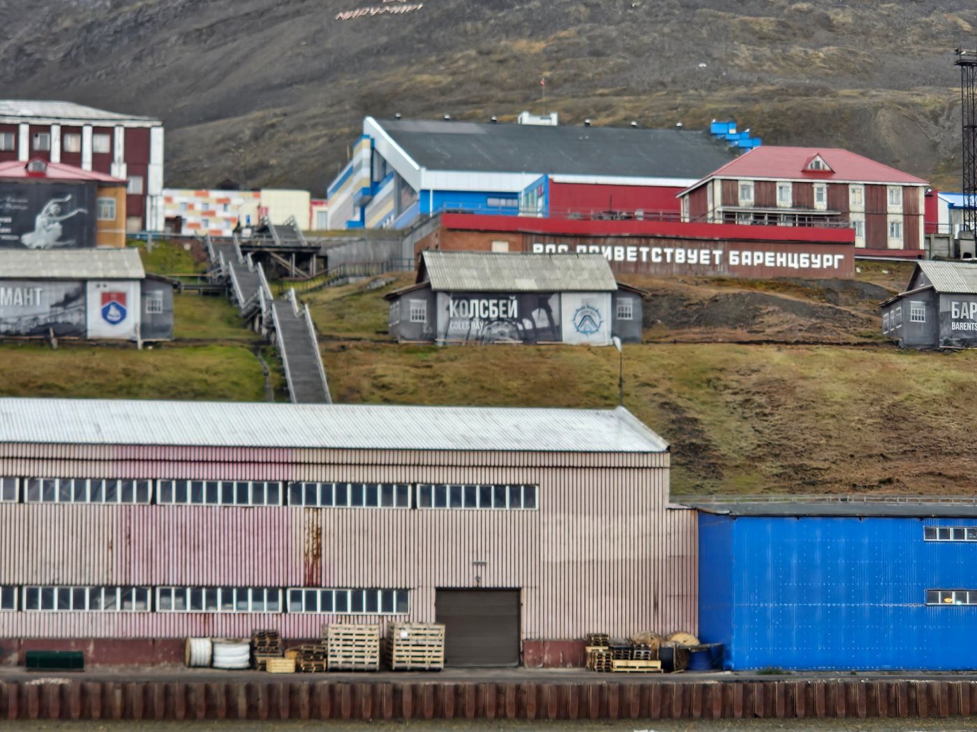 Barentsburg welcomes you, painted above the quay