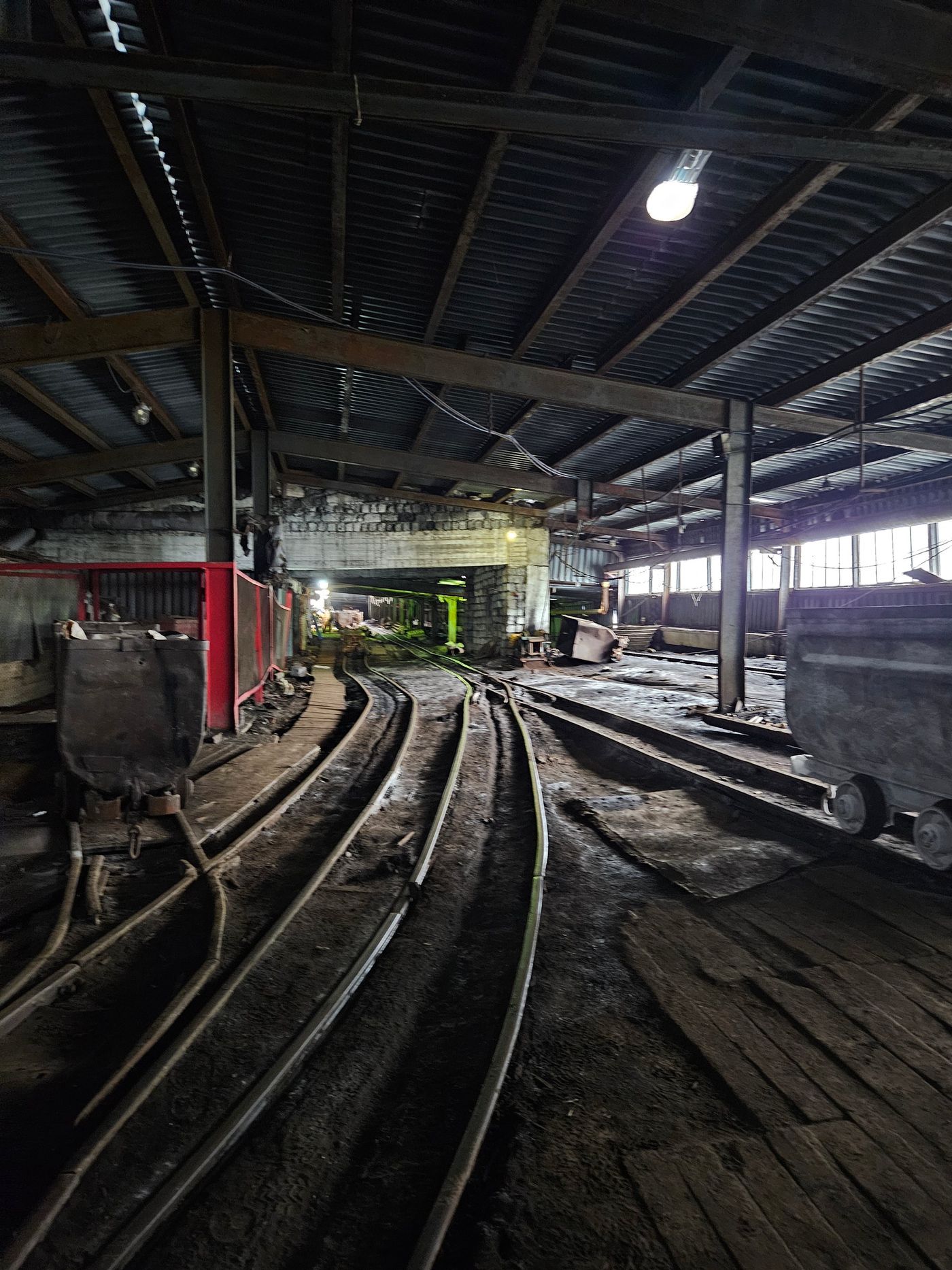 Rails and timber props inside the working coal mine