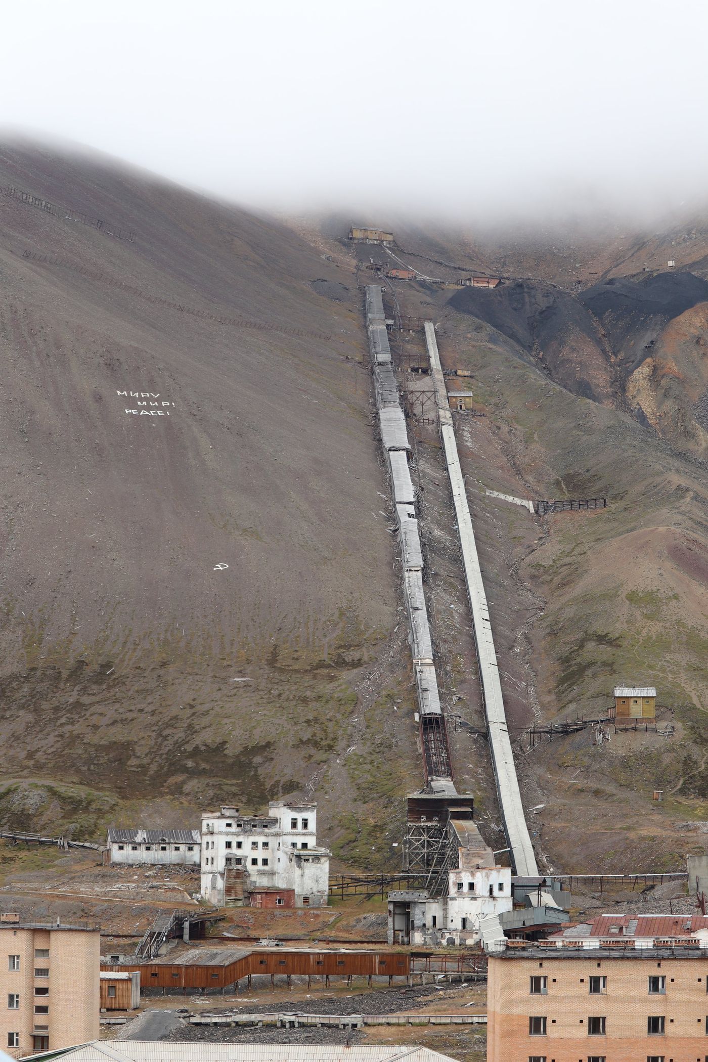 The conveyor climbs straight up to the mine portal