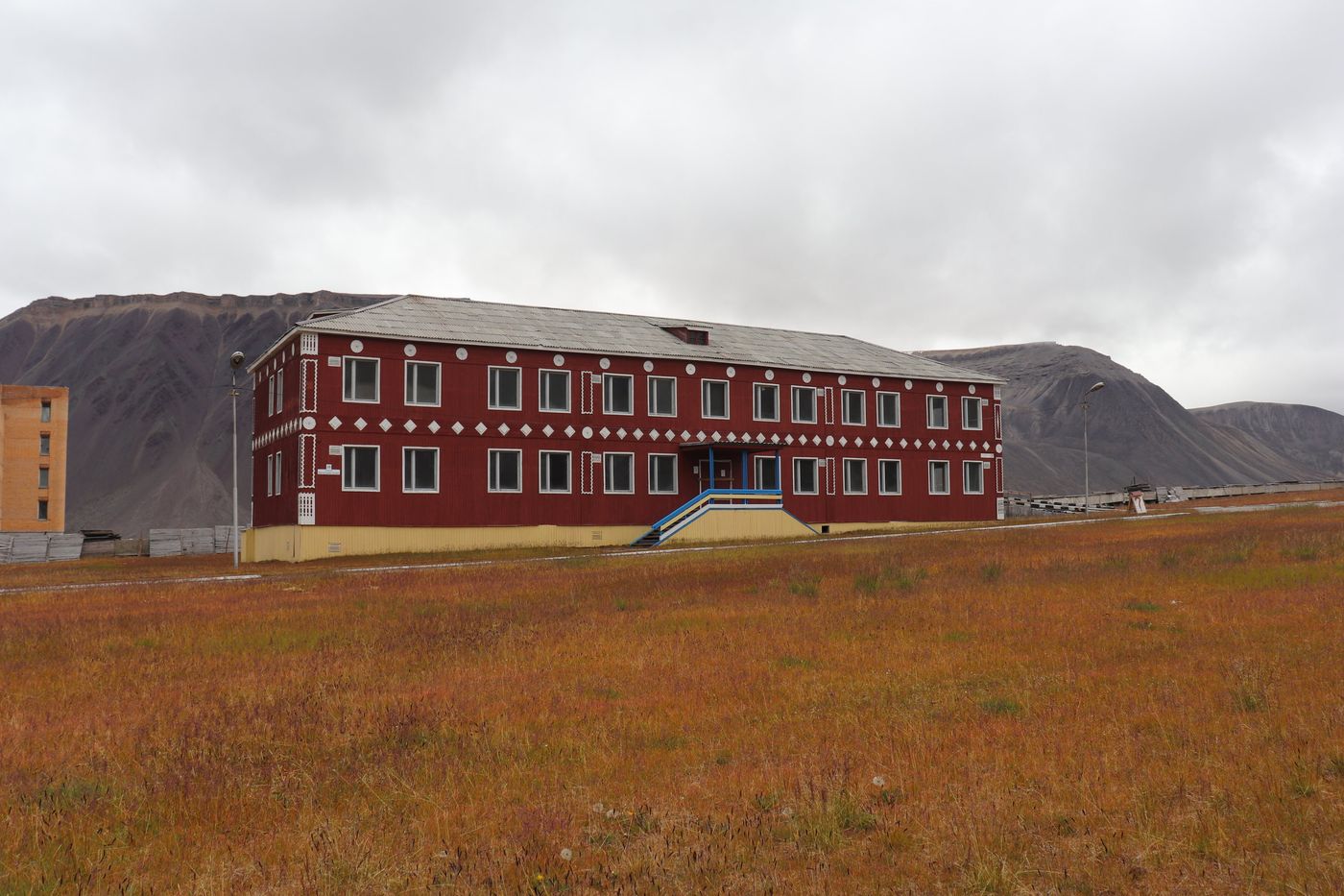 A long red block standing alone on the tundra