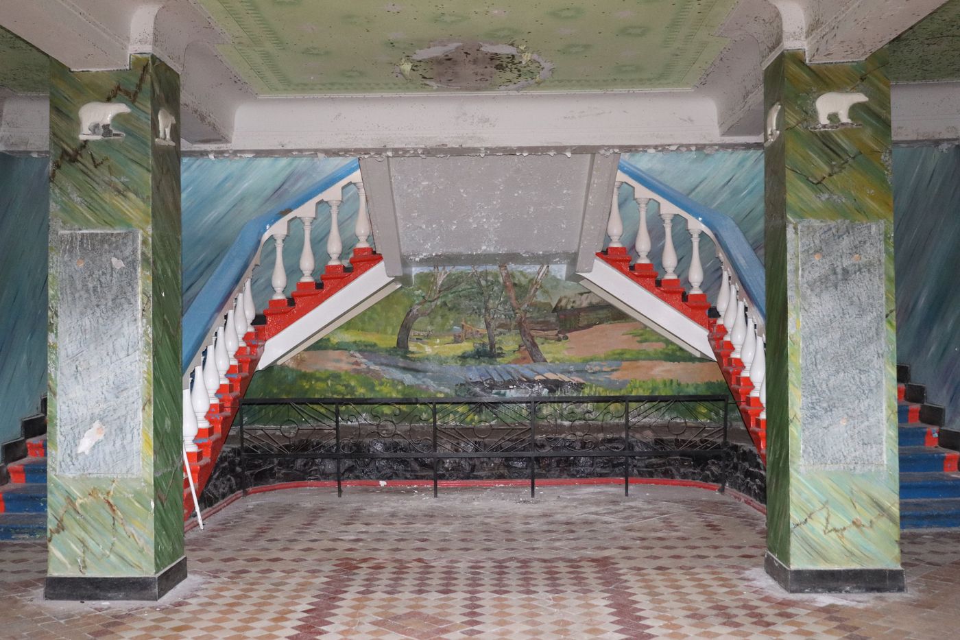Painted birches and polar bears above the stair