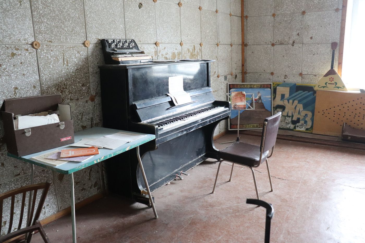 The upright still standing in the music room
